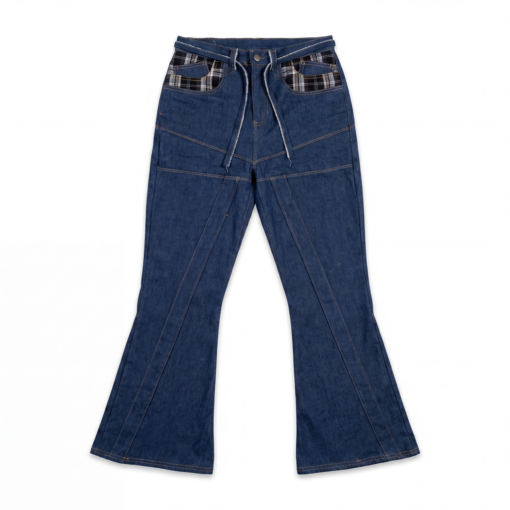 Vaqueros raw denim acampanados con parches de tartán